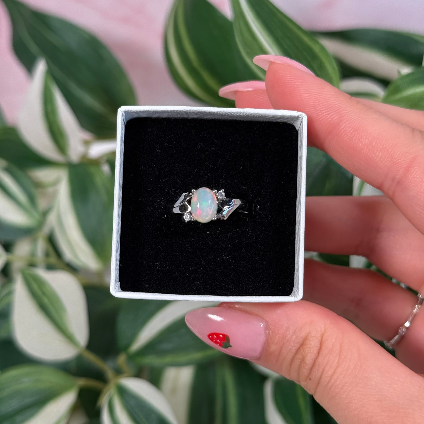 Size 6 Ethiopian opal/cubic zirconia ring