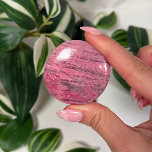 Pink petrified wood flat palmstone