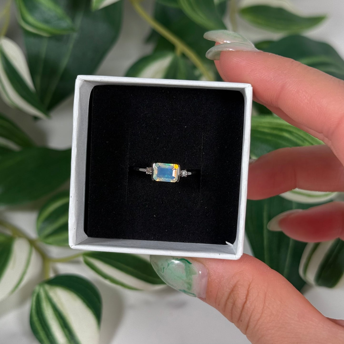 Size 8 Ethiopian opal with natural diamonds ring