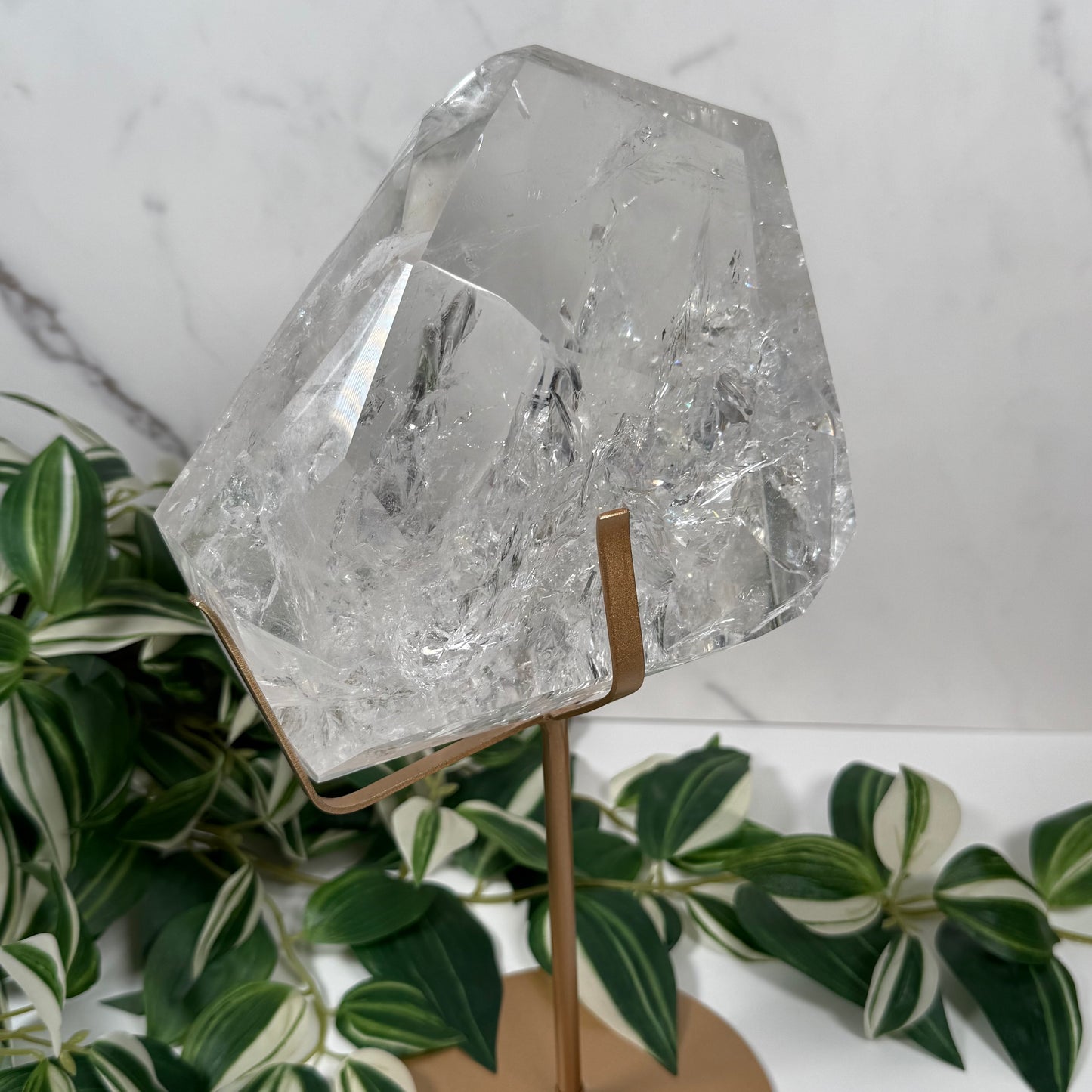 Big clear quartz on stand