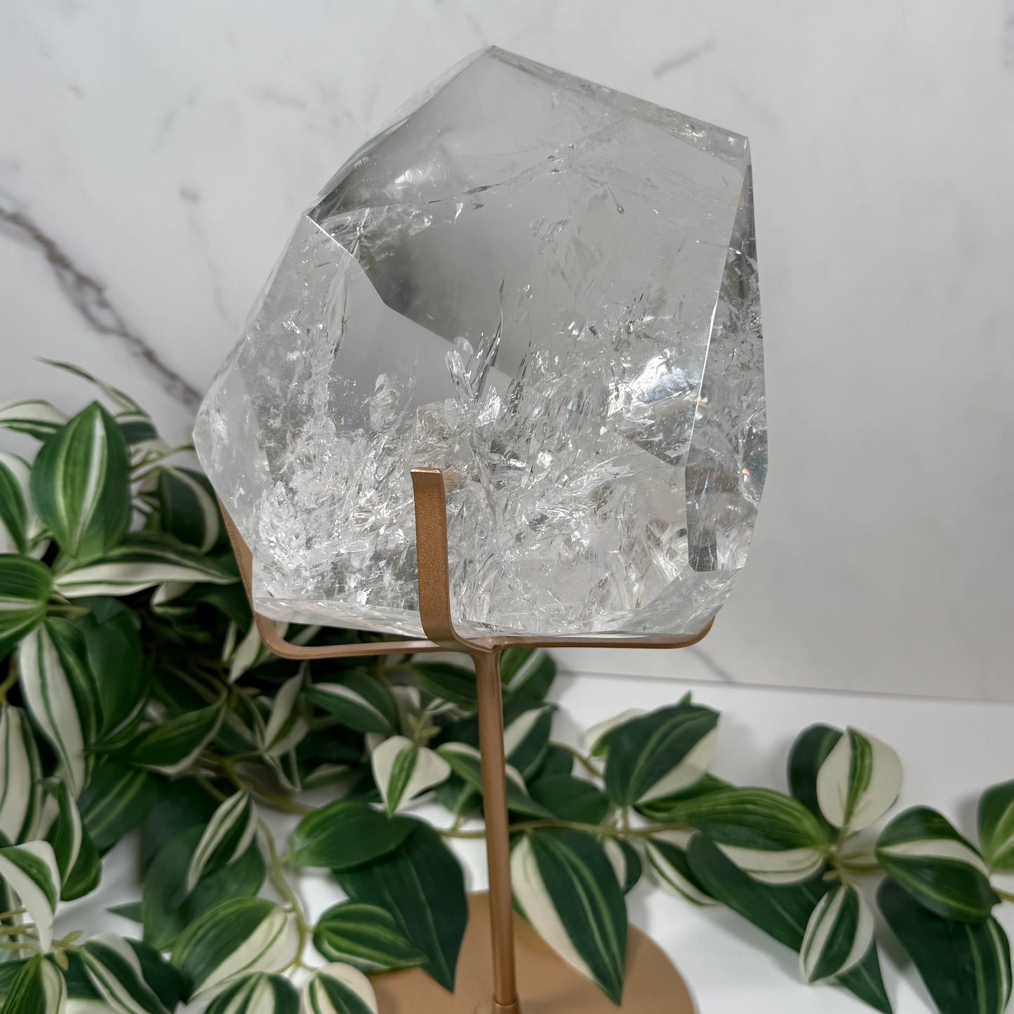Big clear quartz on stand