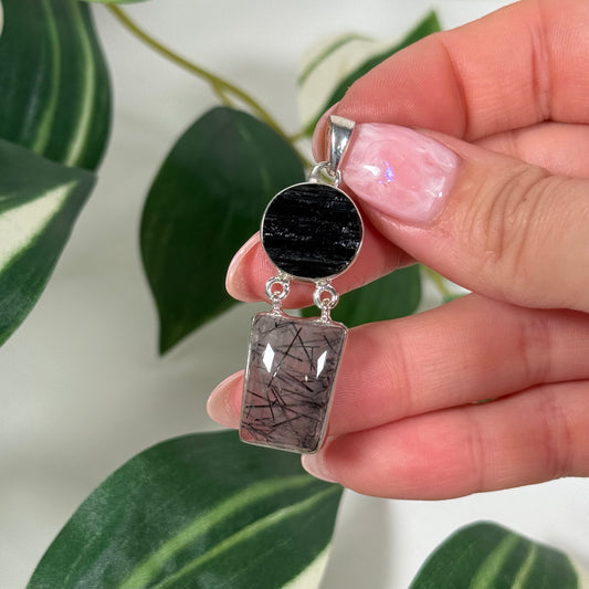 Black tourmaline x tourmaline in quartz pendant