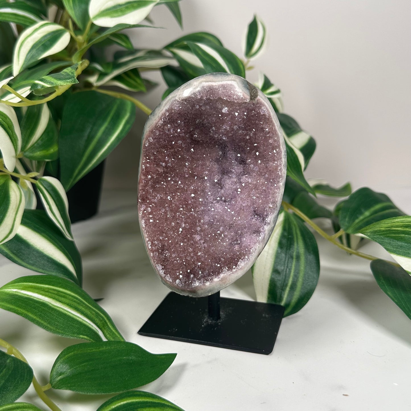 Pinkish amethyst on stand