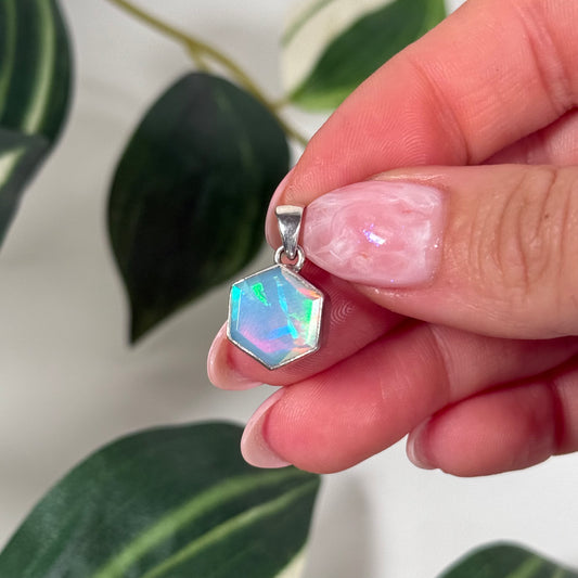 Faceted Ethiopian opal hexagon pendant