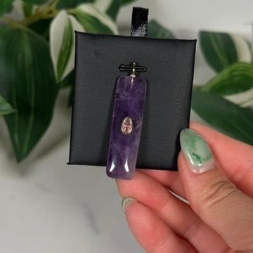 Amethyst with faceted pink topaz pendant