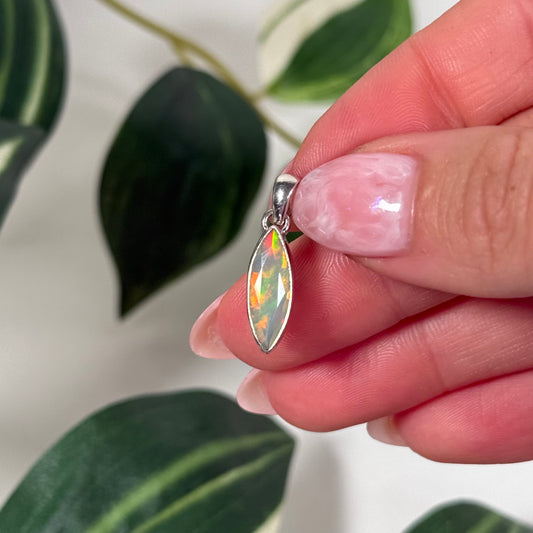 Faceted Ethiopian opal marquise pendant