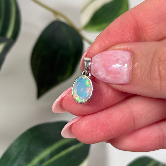 Faceted Ethiopian opal oval pendant