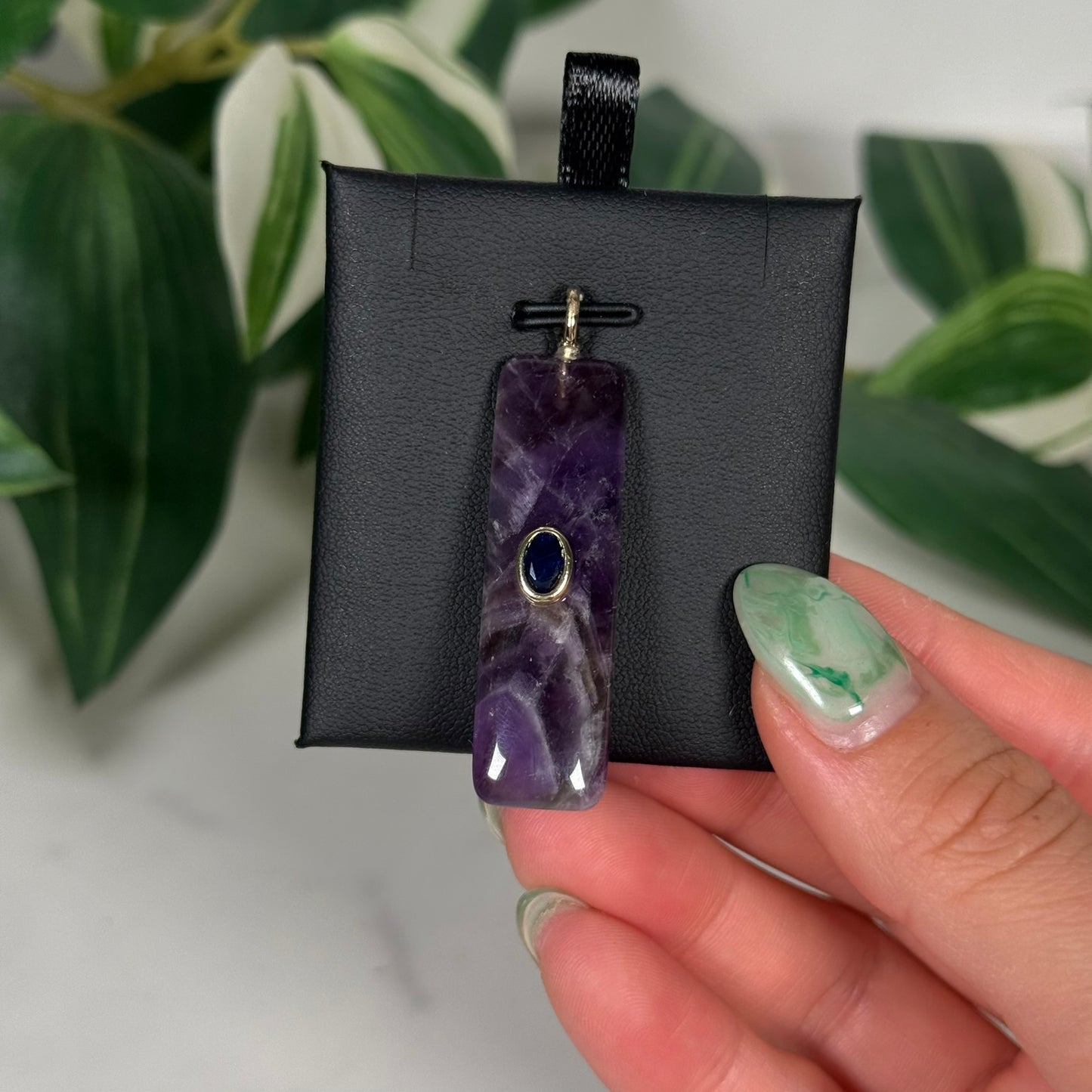 Amethyst with faceted kyanite pendant