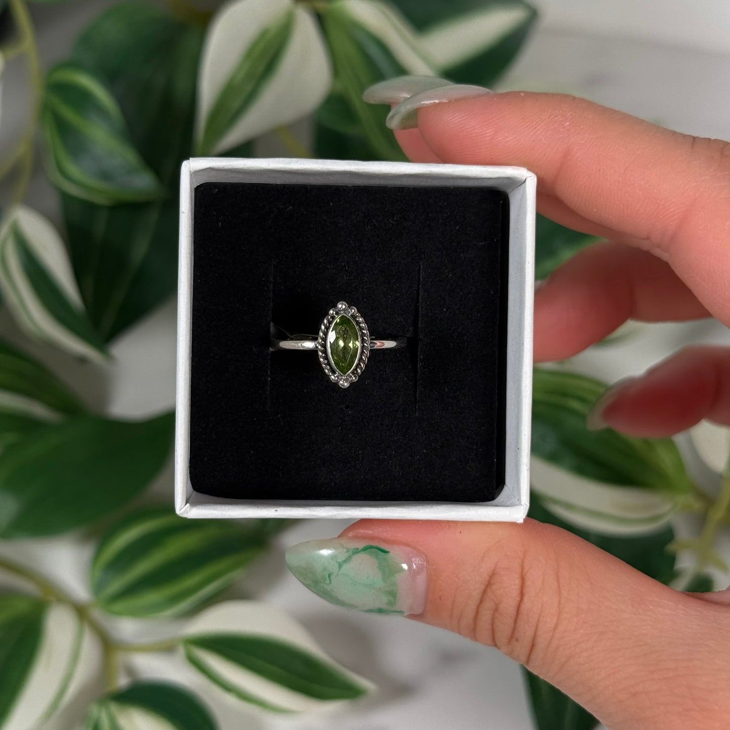 Size 8 peridot ring