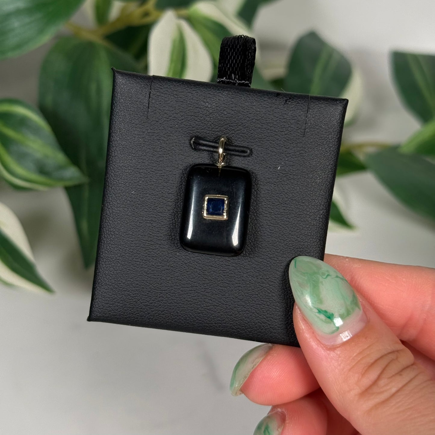 Obsidian with faceted kyanite rectangle pendant