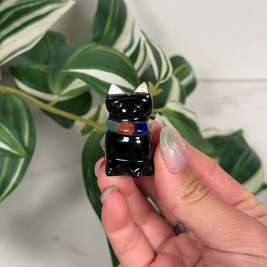 Obsidian cat with collar