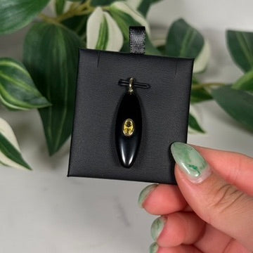 Obsidian with faceted citrine pendant