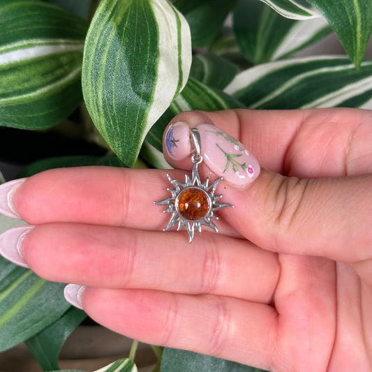 Amber sun pendant