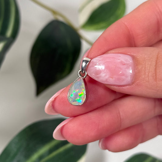 Faceted Ethiopian opal teardrop pendant