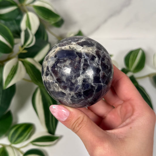 Iolite with sunstone sphere