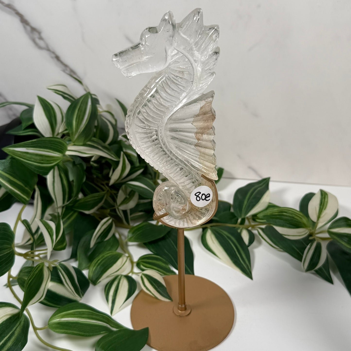 Clear quartz seahorse on stand E