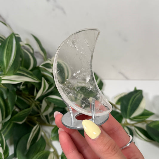 Clear quartz moon on stand