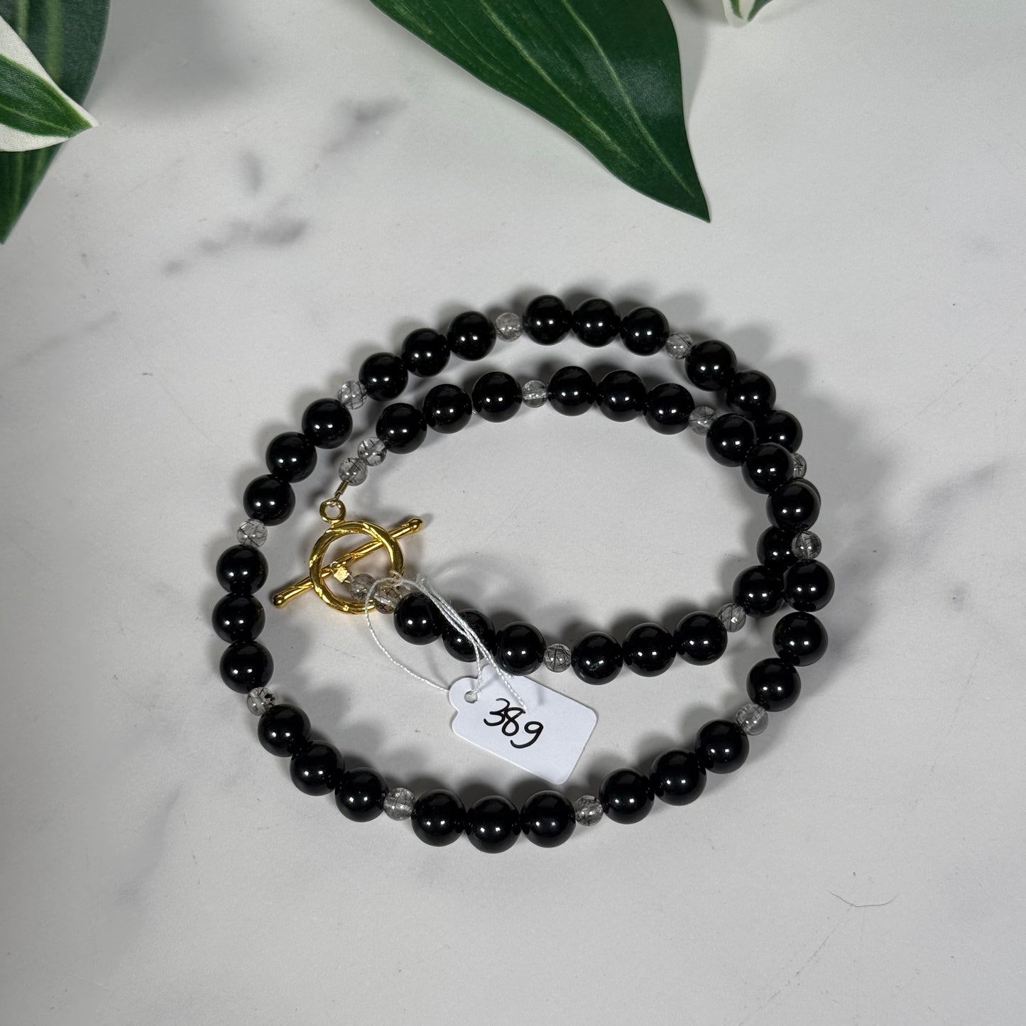 Black tourmaline and tourmaline in quartz gold clasp necklace